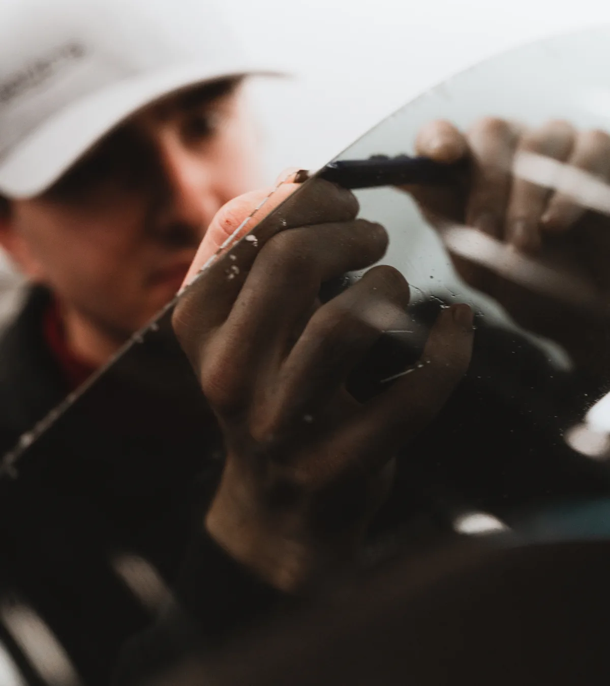 Edge work at the seal during a tint install